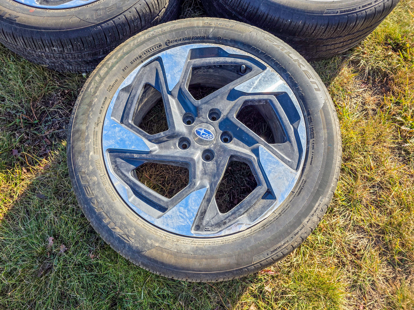 2024 Subaru Rim 18x7 (alloy), (angled spoke), machined face with painted pockets, with tire 225/55 R18 Wheel