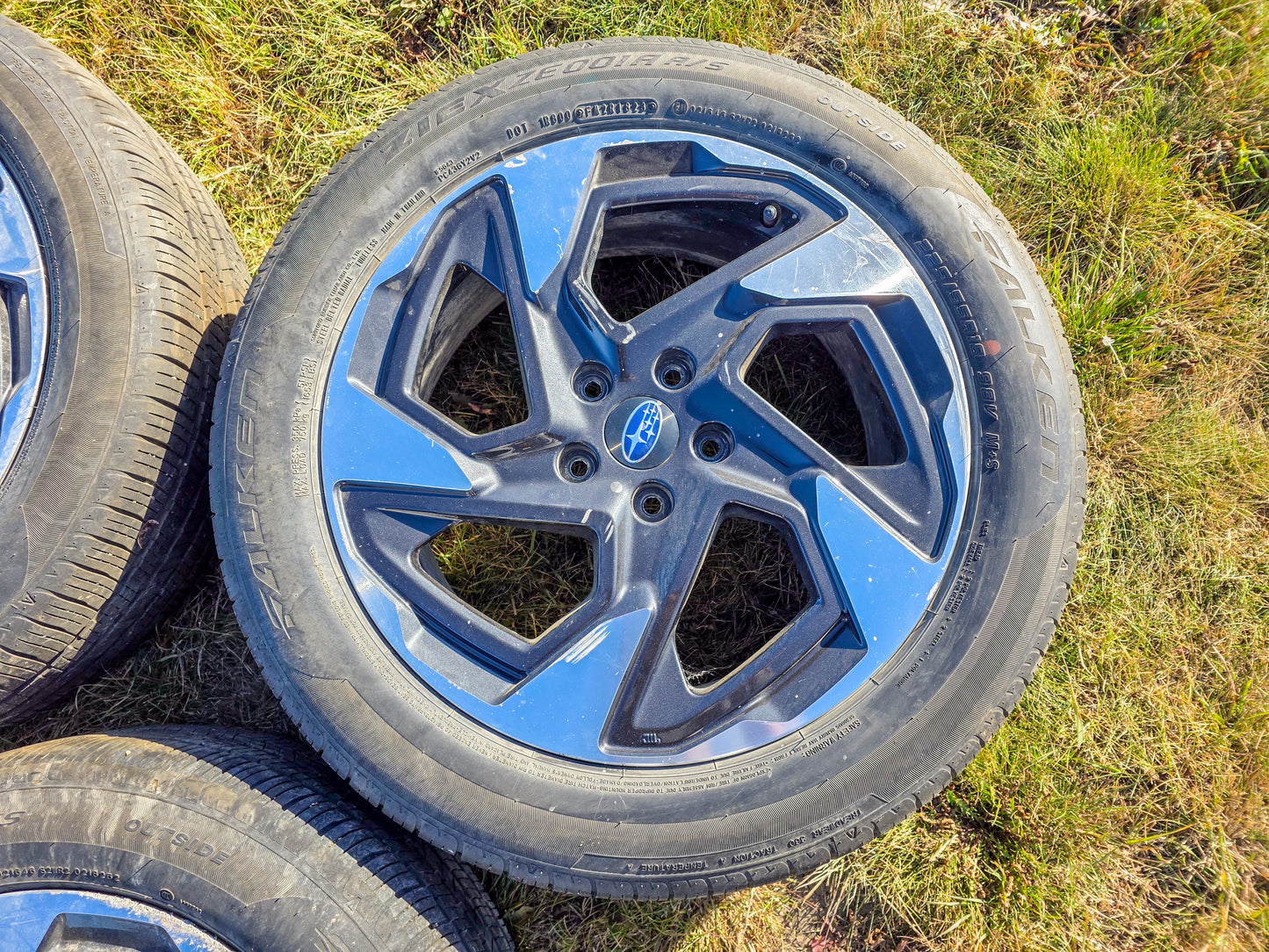 2024 Subaru Rim 18x7 (alloy), (angled spoke), machined face with painted pockets, with tire 225/55 R18 Wheel