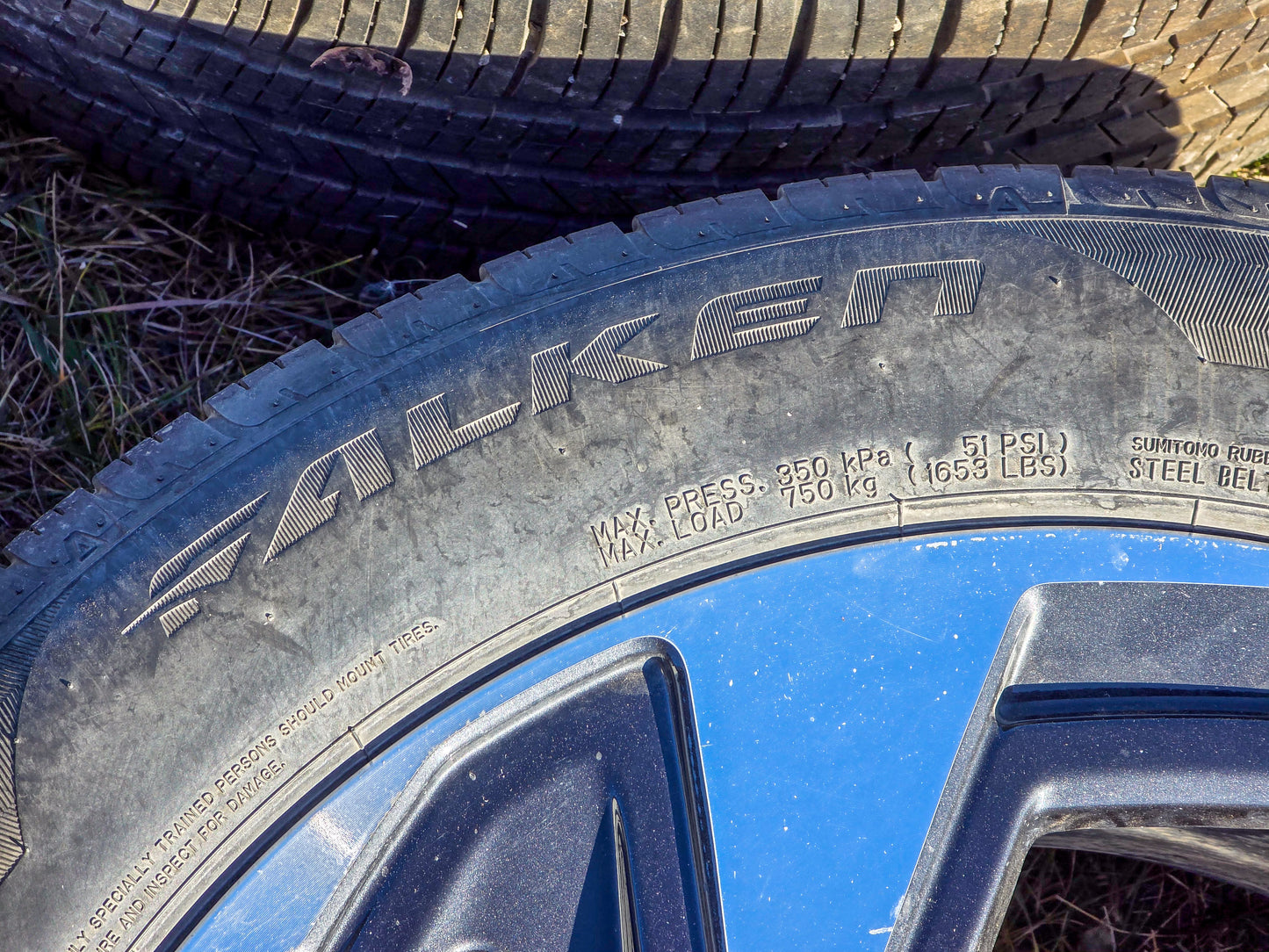 2024 Subaru Rim 18x7 (alloy), (angled spoke), machined face with painted pockets, with tire 225/55 R18 Wheel